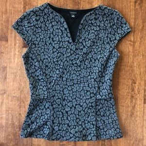Fun top with faux leather detail